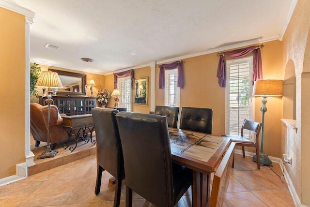 2902 Rainwood St, Spring, TX 77388 - dining room with crown molding and light tile patterned flooring