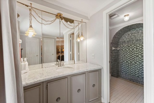 2902 Rainwood St, Spring, TX 77388 - bathroom with vanity, a tile shower, ornamental molding, and tile patterned flooring