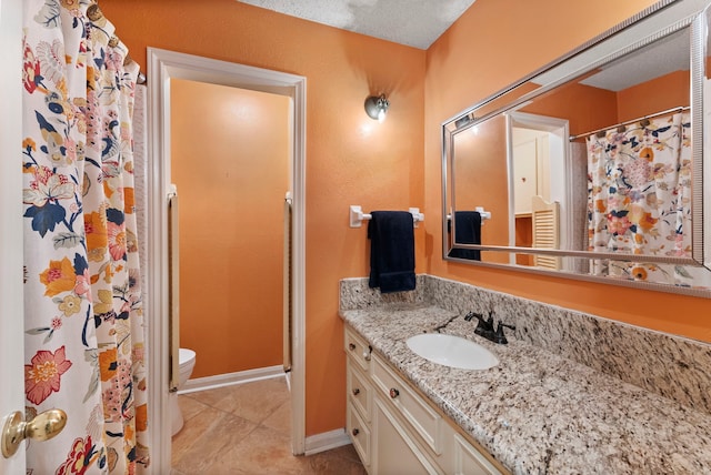 2902 Rainwood St, Spring, TX 77388 - full bath featuring vanity, tile patterned floors, and curtained shower