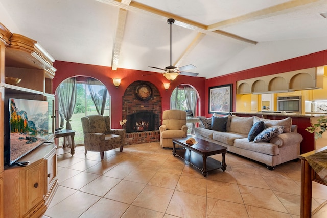 2902 Rainwood St, Spring, TX 77388 - living room with light tile patterned flooring, a ceiling fan, and a brick fireplace