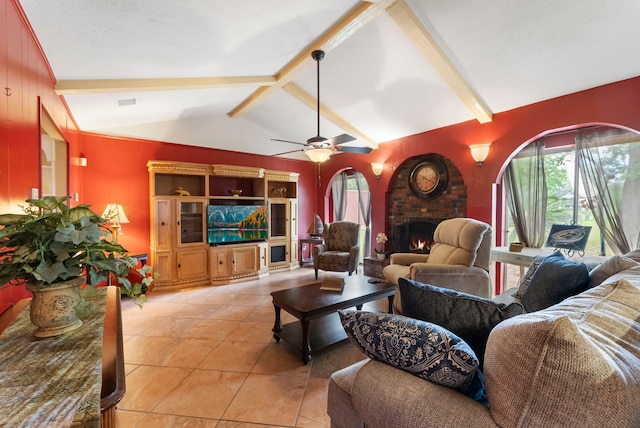 2902 Rainwood St, Spring, TX 77388 - living area with light tile patterned floors, a brick fireplace, and a ceiling fan