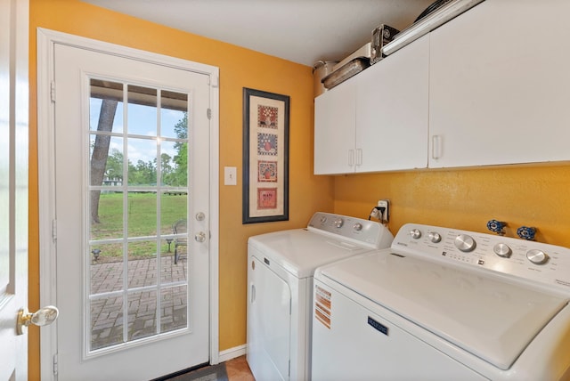 2902 Rainwood St, Spring, TX 77388 - laundry room with cabinet space, separate washer and dryer, and healthy amount of natural light