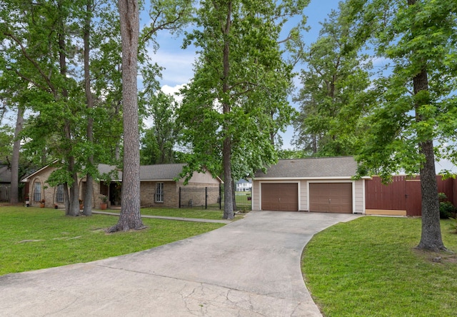 2902 Rainwood St, Spring, TX 77388 - view of front of house featuring a garage and driveway