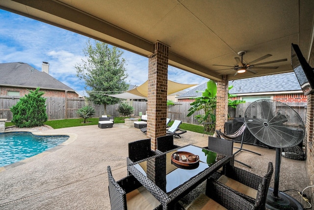 13723 Playa Lucia Ct, Houston, TX 77044 - fenced backyard featuring a patio area and a ceiling fan