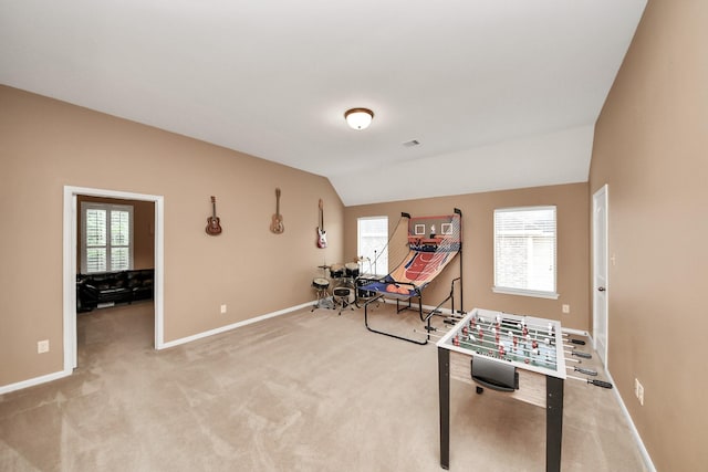 13723 Playa Lucia Ct, Houston, TX 77044 - rec room with lofted ceiling, healthy amount of natural light, and light carpet