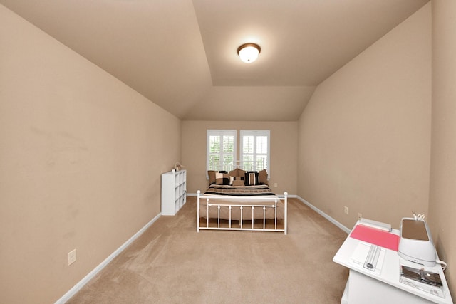 13723 Playa Lucia Ct, Houston, TX 77044 - carpeted bedroom with baseboards and vaulted ceiling