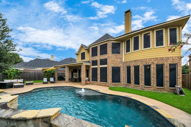 13723 Playa Lucia Ct, Houston, TX 77044 - view of swimming pool featuring an outdoor hangout area, a patio area, and a fenced backyard