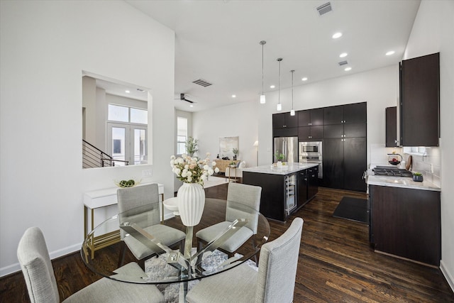 805 Sandman St, Houston, TX 77007 - dining room featuring dark wood-style flooring and recessed lighting