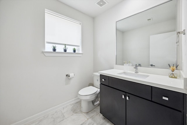 805 Sandman St, Houston, TX 77007 - bathroom featuring marble look tiles and vanity