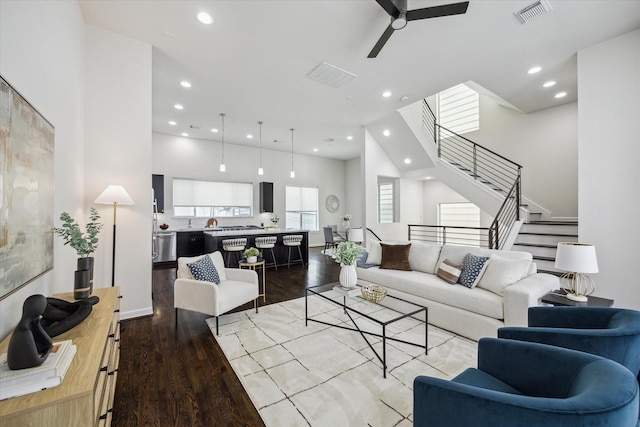805 Sandman St, Houston, TX 77007 - living area featuring recessed lighting, light wood-style floors, ceiling fan, and stairs