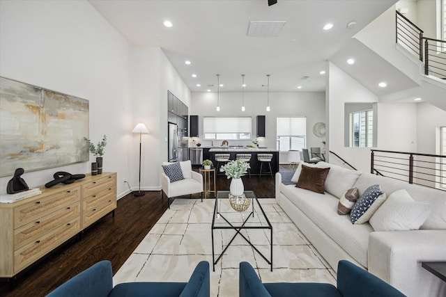805 Sandman St, Houston, TX 77007 - living area featuring light wood finished floors, recessed lighting, and a towering ceiling
