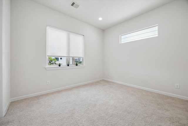 805 Sandman St, Houston, TX 77007 - carpeted spare room with baseboards and recessed lighting
