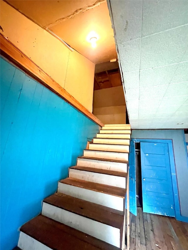 206 E Rogers St, Ganado, TX 77962 - staircase with wood finished floors
