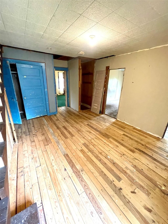 206 E Rogers St, Ganado, TX 77962 - spare room featuring hardwood / wood-style flooring