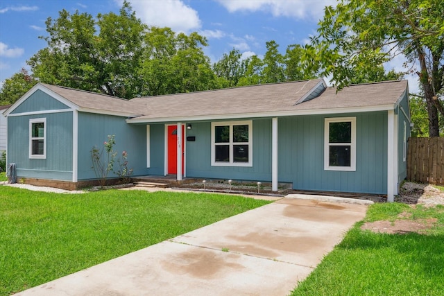210 Laurel St, Lake Jackson, TX 77566 - ranch-style home featuring a porch, a shingled roof, and driveway
