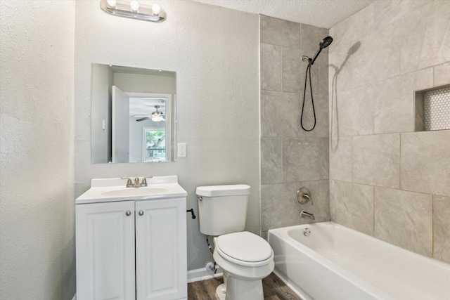 210 Laurel St, Lake Jackson, TX 77566 - full bathroom featuring wood finished floors, vanity, shower / tub combination, and a textured wall