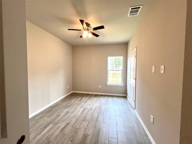 16897 W Alderson, Montgomery, TX 77316 - spare room featuring wood finished floors and ceiling fan