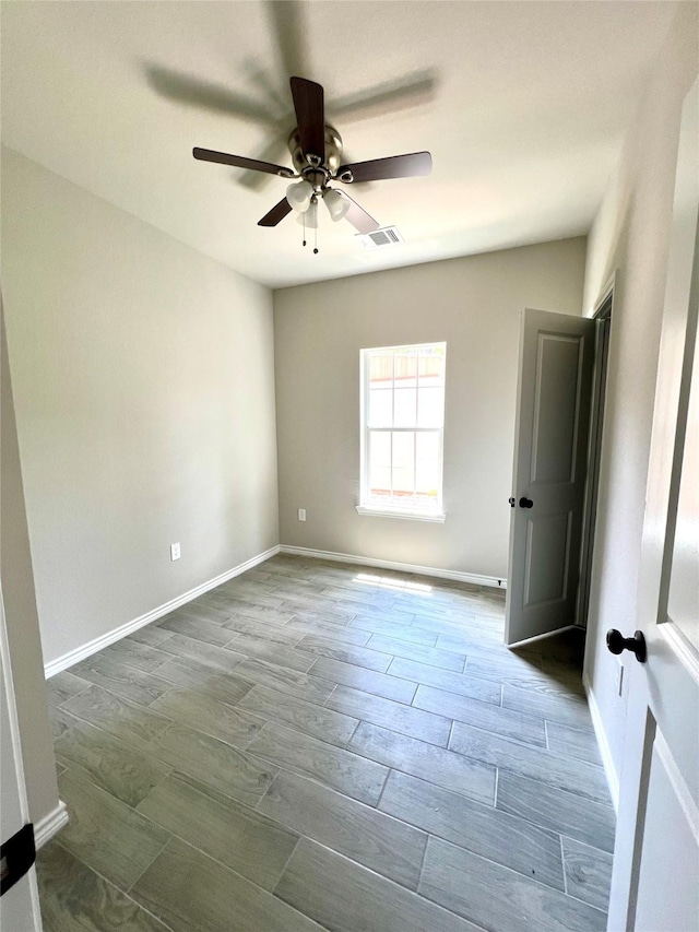 16897 W Alderson, Montgomery, TX 77316 - empty room featuring a ceiling fan and wood finished floors