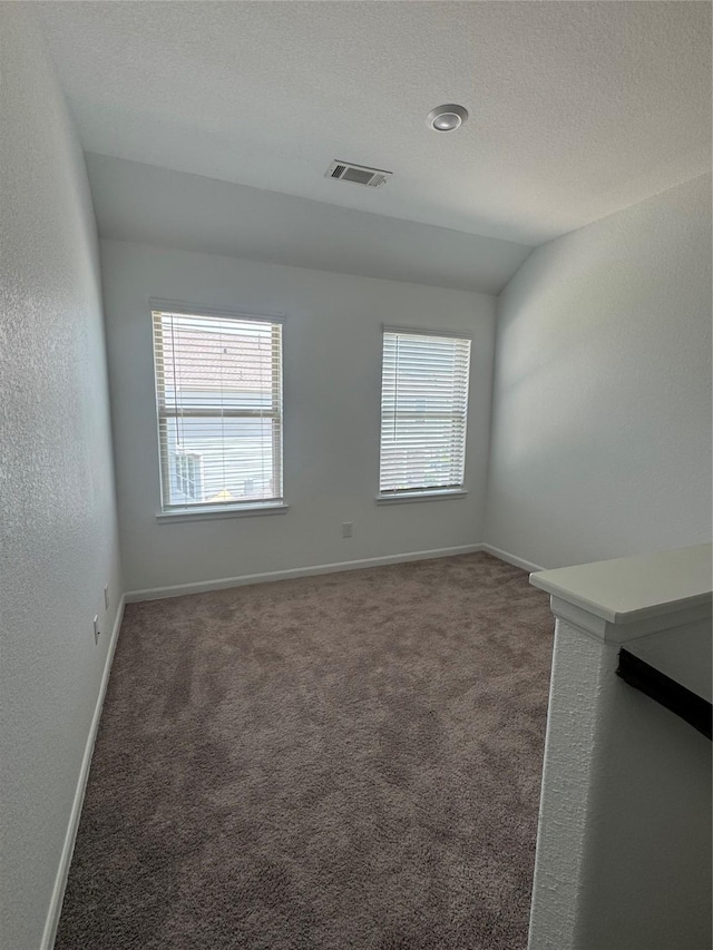 214 Fulton Station Dr, Houston, TX 77009 - unfurnished room featuring carpet floors and a textured ceiling