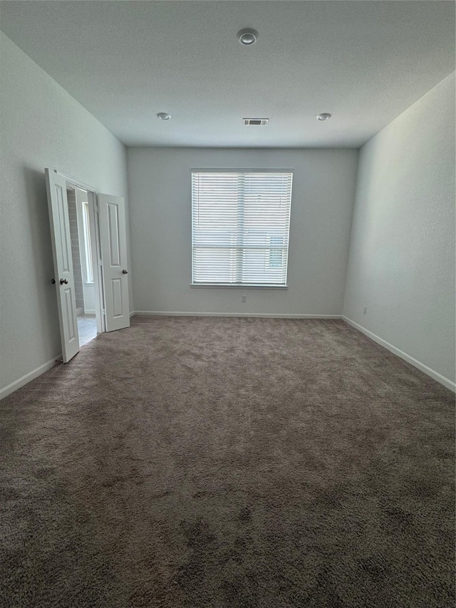 214 Fulton Station Dr, Houston, TX 77009 - empty room with carpet and baseboards