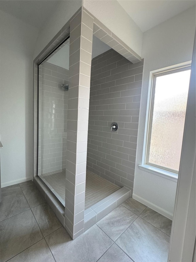 214 Fulton Station Dr, Houston, TX 77009 - bathroom with a stall shower and tile patterned flooring