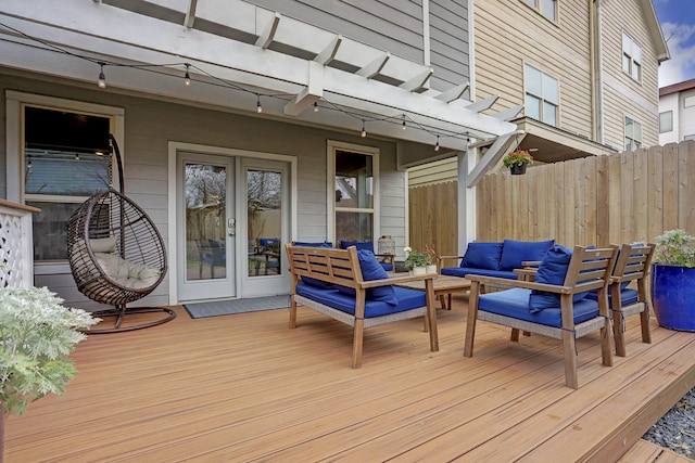 1113 Peden St Unit A, Houston, TX 77006 - wooden terrace with outdoor lounge area, a pergola, and french doors