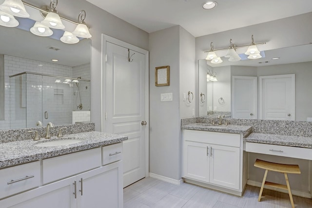 1113 Peden St Unit A, Houston, TX 77006 - full bathroom with a stall shower, two vanities, and recessed lighting