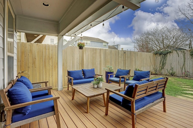1113 Peden St Unit A, Houston, TX 77006 - wooden deck with outdoor lounge area and a fenced backyard