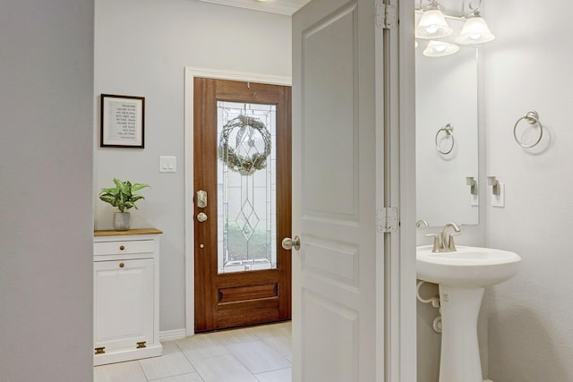 1113 Peden St Unit A, Houston, TX 77006 - foyer entrance with light tile patterned flooring and baseboards