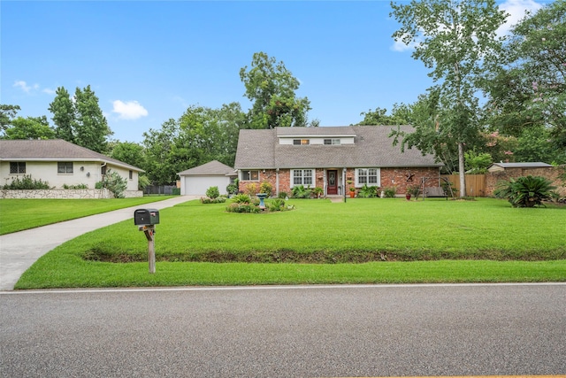 18910 Casper Dr, Spring, TX 77373 - view of front facade featuring a detached garage and brick siding