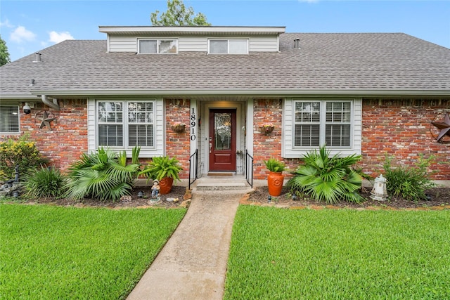 18910 Casper Dr, Spring, TX 77373 - view of front of home with roof with shingles and a front yard