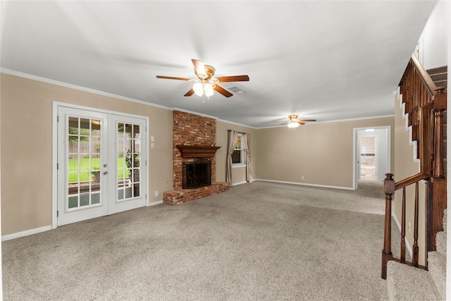 18910 Casper Dr, Spring, TX 77373 - unfurnished living room with french doors, ceiling fan, carpet, stairway, and ornamental molding