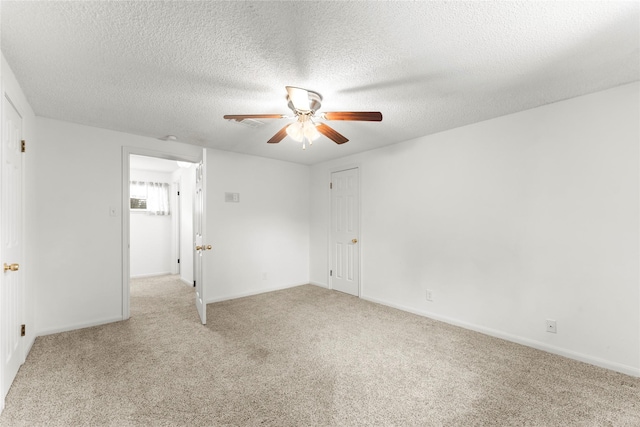 18910 Casper Dr, Spring, TX 77373 - unfurnished room with ceiling fan, a textured ceiling, and light carpet
