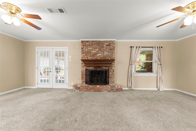 18910 Casper Dr, Spring, TX 77373 - unfurnished living room featuring a ceiling fan, crown molding, a brick fireplace, and carpet