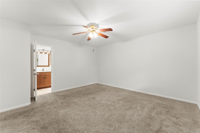 18910 Casper Dr, Spring, TX 77373 - empty room featuring light carpet and a ceiling fan