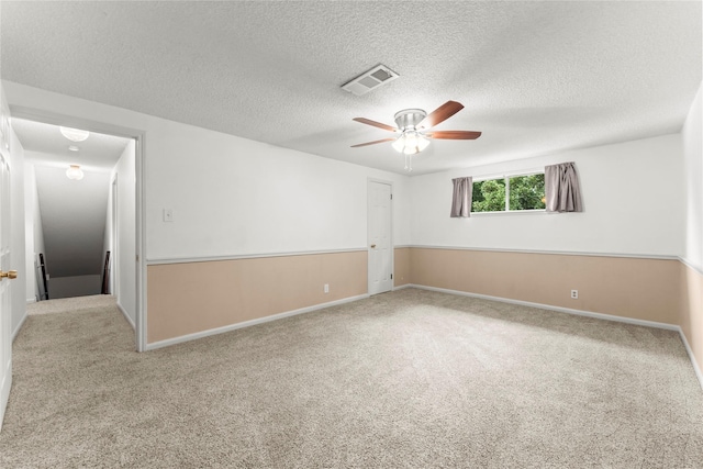 18910 Casper Dr, Spring, TX 77373 - unfurnished room featuring ceiling fan, carpet flooring, and a textured ceiling