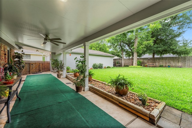 18910 Casper Dr, Spring, TX 77373 - fenced backyard featuring a patio and a ceiling fan