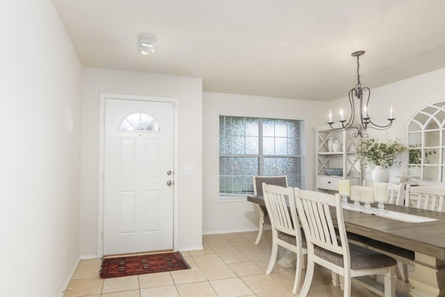 14903 Sugar Sweet Dr, Sugar Land, TX 77498 - dining area featuring a chandelier and light tile patterned flooring