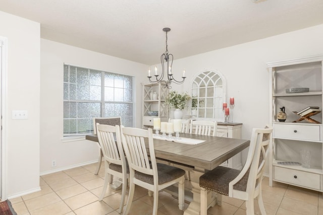 14903 Sugar Sweet Dr, Sugar Land, TX 77498 - dining room featuring a chandelier and light tile patterned flooring