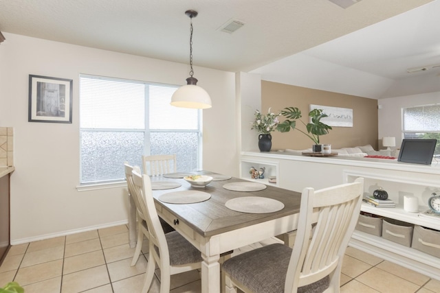 14903 Sugar Sweet Dr, Sugar Land, TX 77498 - dining area with light tile patterned flooring