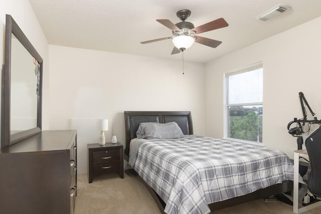 14903 Sugar Sweet Dr, Sugar Land, TX 77498 - bedroom featuring light colored carpet and ceiling fan