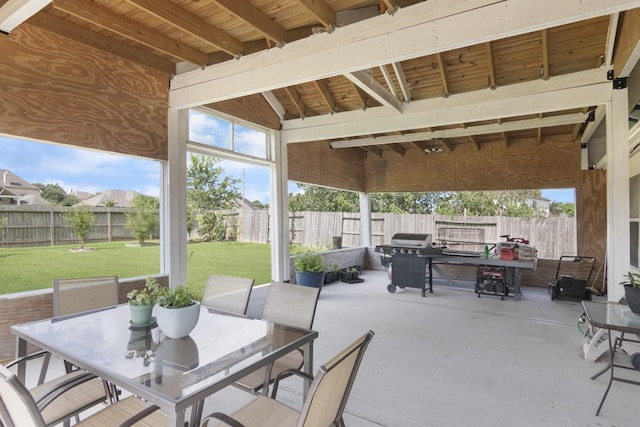 14903 Sugar Sweet Dr, Sugar Land, TX 77498 - fenced backyard with outdoor dining area, a patio, and area for grilling