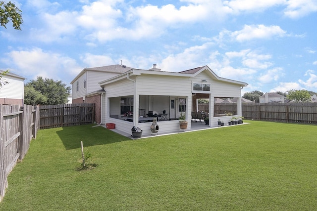 14903 Sugar Sweet Dr, Sugar Land, TX 77498 - back of house with a patio, a fenced backyard, brick siding, and a chimney