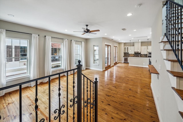 431 Jackson Hill St, Houston, TX 77007 - hall featuring light wood-style floors, recessed lighting, and stairs