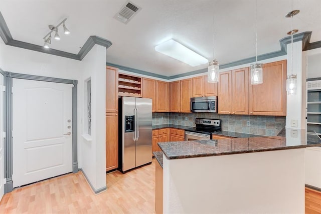 1711 Old Spanish Trl Unit 110, Houston, TX 77054 - kitchen with appliances with stainless steel finishes, tasteful backsplash, light wood-type flooring, ornamental molding, and dark stone counters