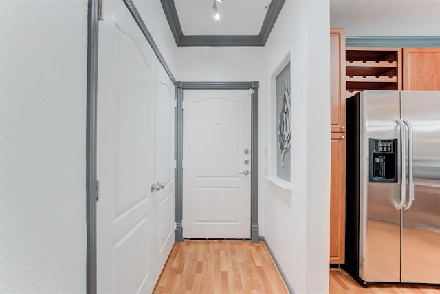 1711 Old Spanish Trl Unit 110, Houston, TX 77054 - entryway with light wood-type flooring and crown molding