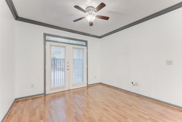 1711 Old Spanish Trl Unit 110, Houston, TX 77054 - unfurnished room with ornamental molding, light wood-style floors, a ceiling fan, and french doors