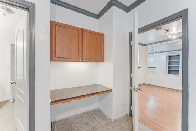 1711 Old Spanish Trl Unit 110, Houston, TX 77054 - corridor featuring crown molding and baseboards