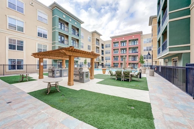 1711 Old Spanish Trl Unit 110, Houston, TX 77054 - view of community featuring a pergola and a swimming pool