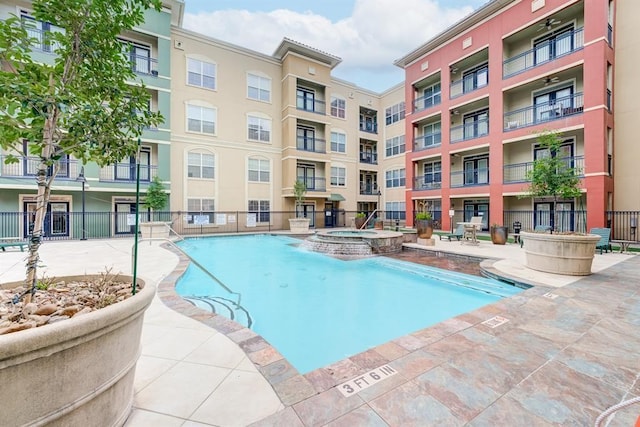 1711 Old Spanish Trl Unit 110, Houston, TX 77054 - view of swimming pool with a pool with connected hot tub